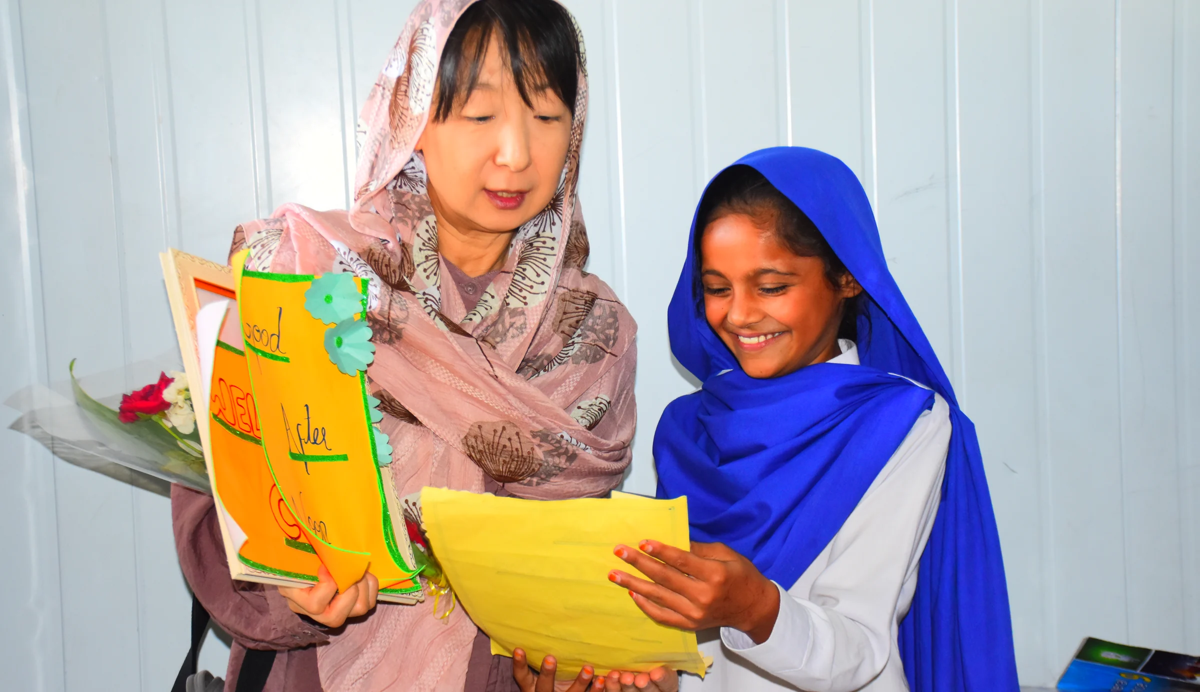 Children learning with KnK Pakistan