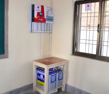 Inverter and battery cabinet installed at a facility